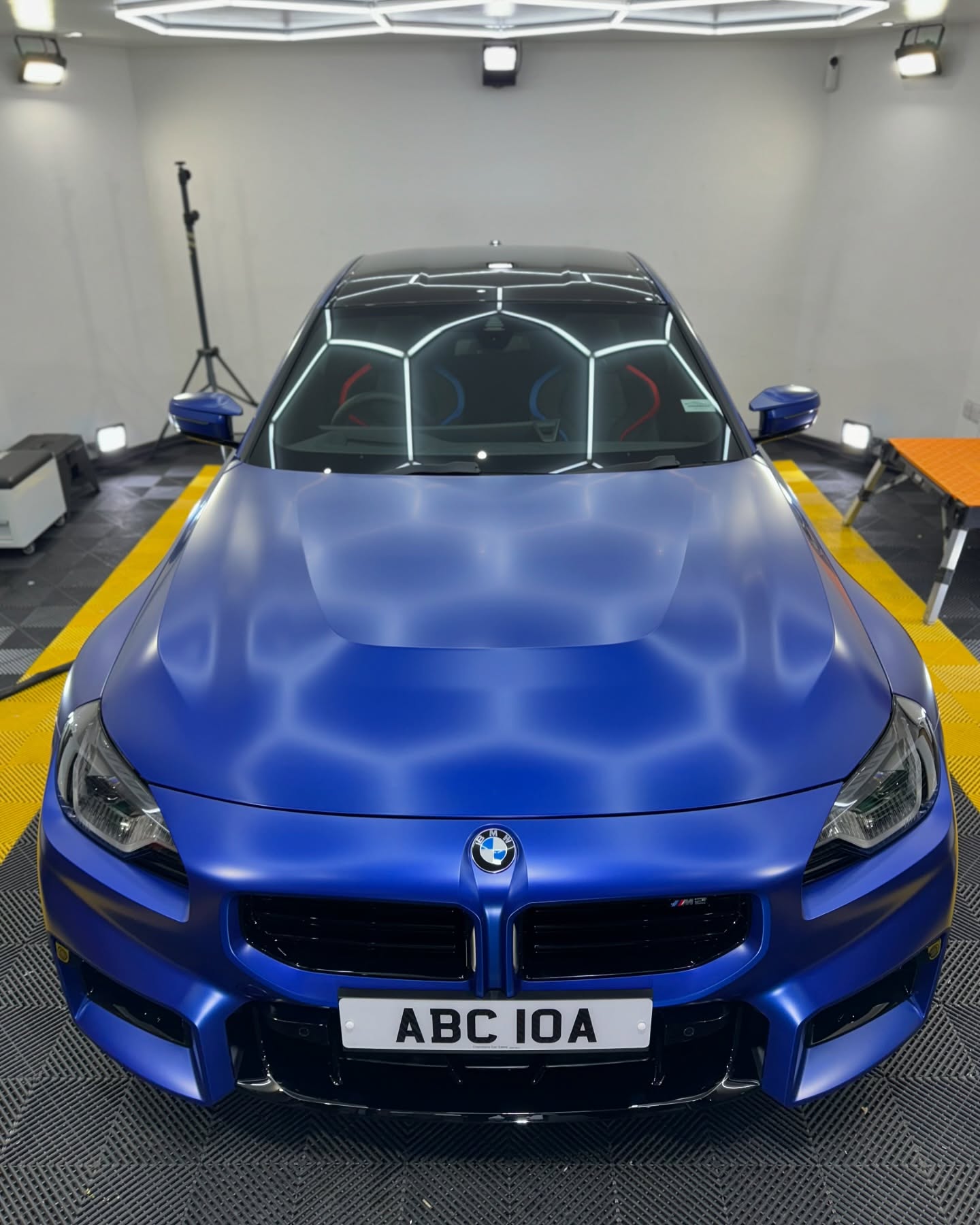 Blue BMW M in the detailing studio
