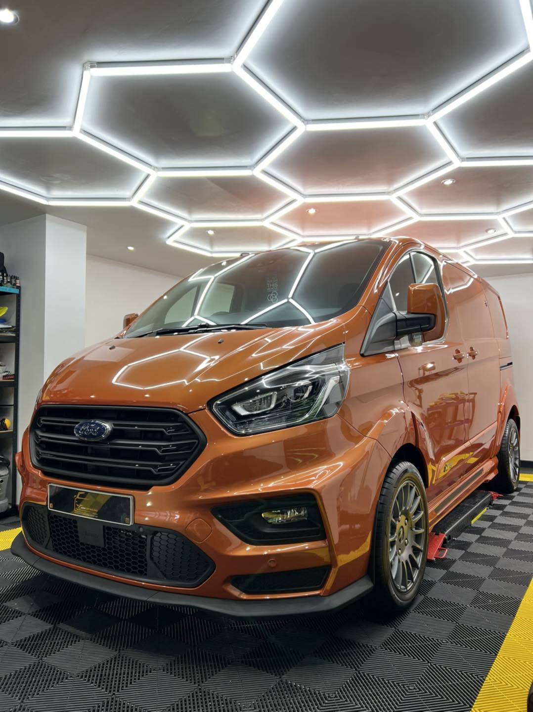 Orange Ford Transit finished in the JMM Detailing studio